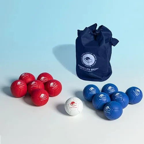 A navy drawstring bag with six red and six blue small boccia balls and one white target ball.