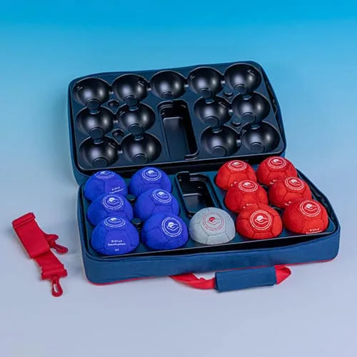 Open navy boccia case holding red and blue suede balls and one white target ball, with a red strap.