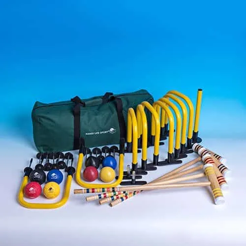 A croquet set: a green bag, yellow hoops, wooden mallets and colour-coded balls.
